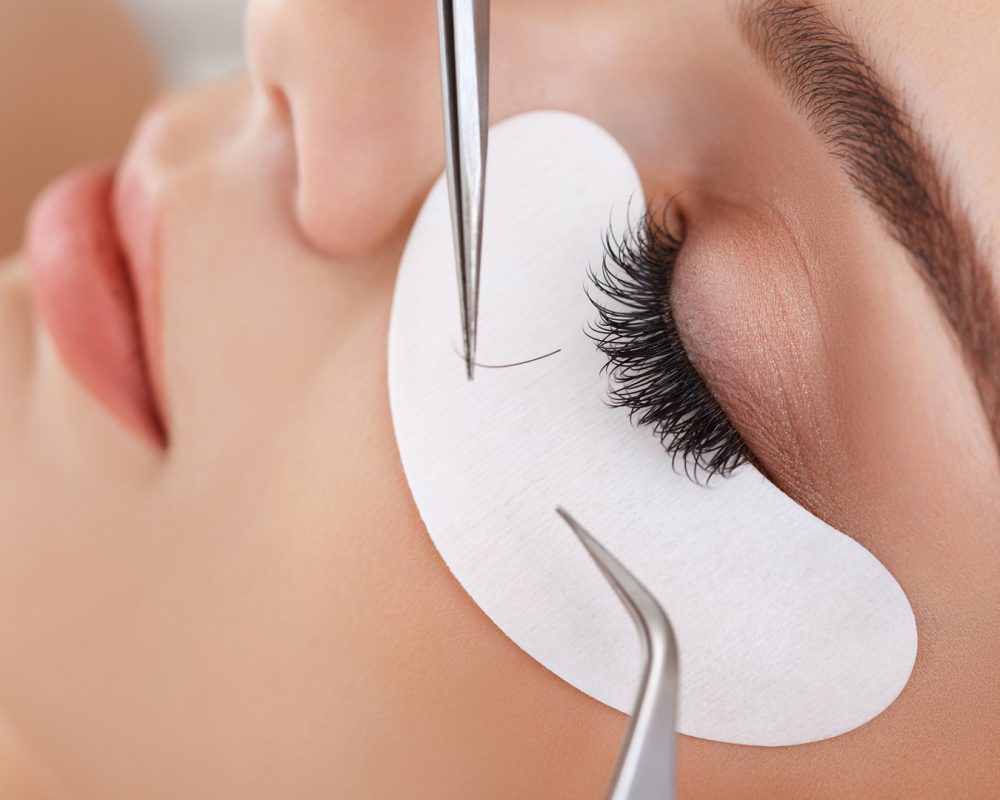 Woman Eye with Long Eyelashes. Eyelash Extension Woman Eye with Long Eyelashes. Eyelash Extension